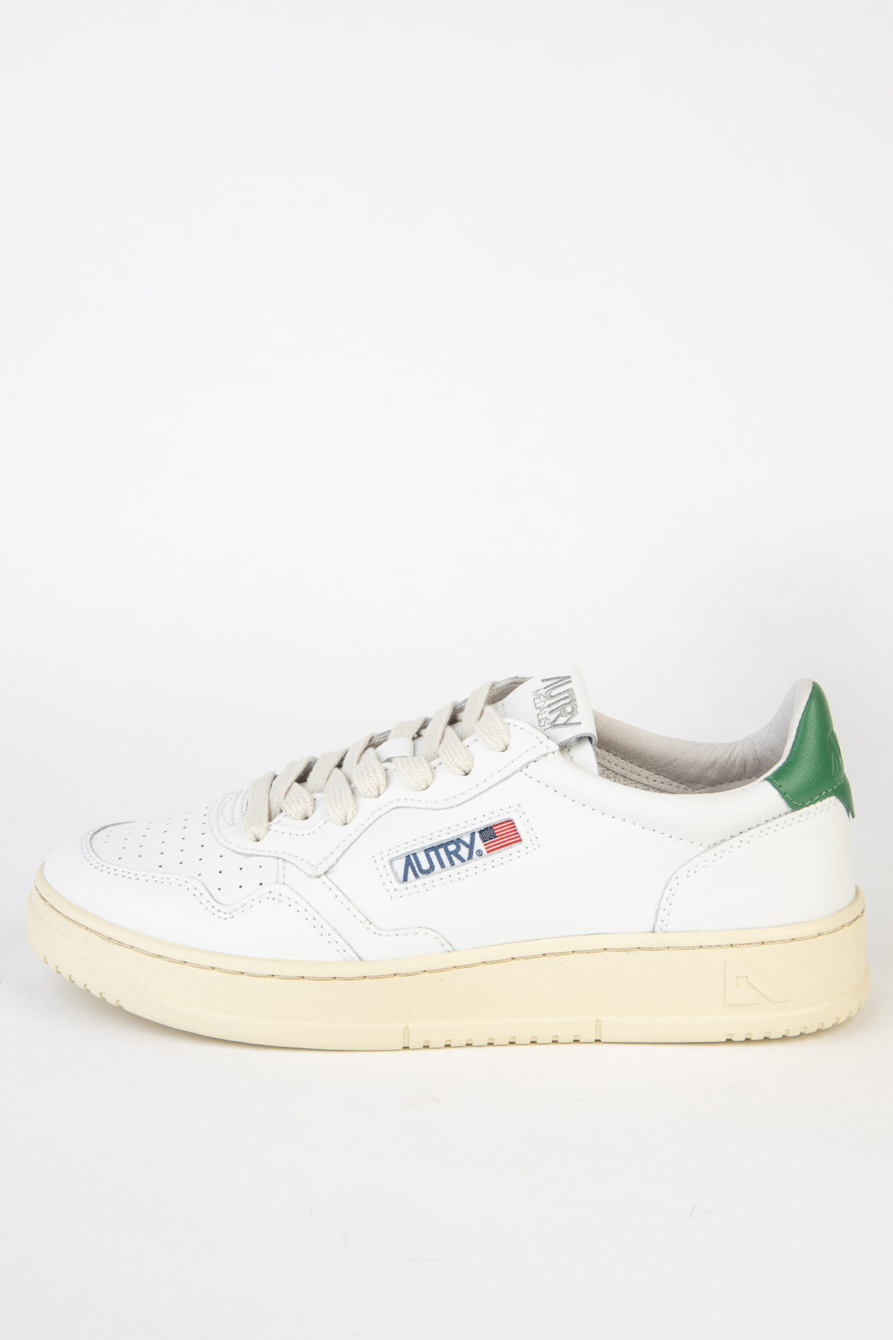 “Medalist LL20” sneaker in white/green (women’s) made of leather