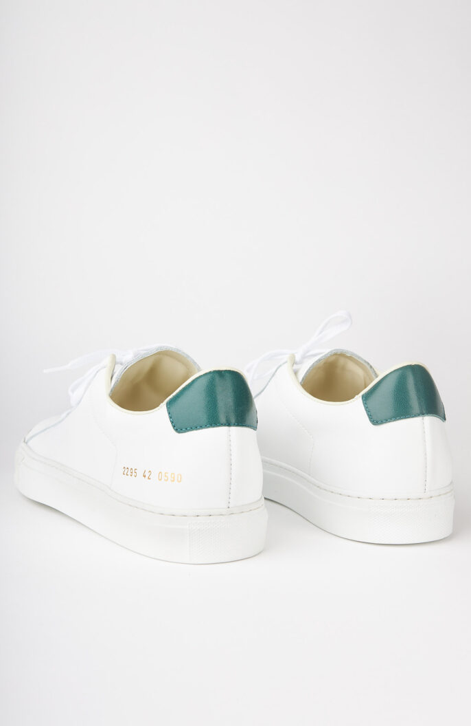 White sneaker "Retro low 2295" with green heel detail