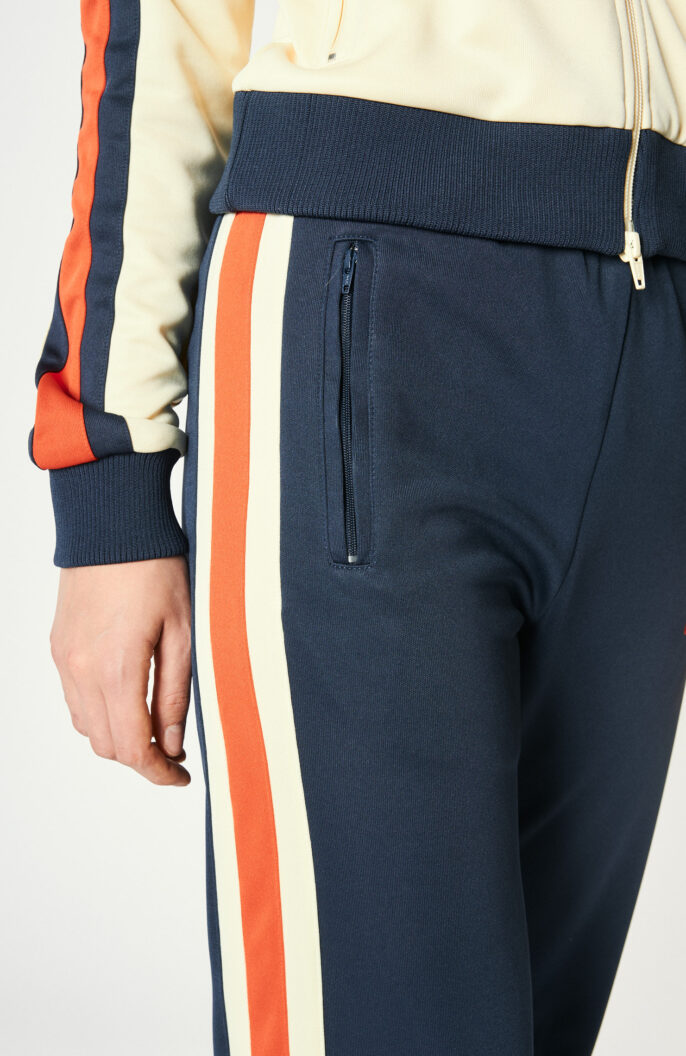 Track pants with side stripes in blue