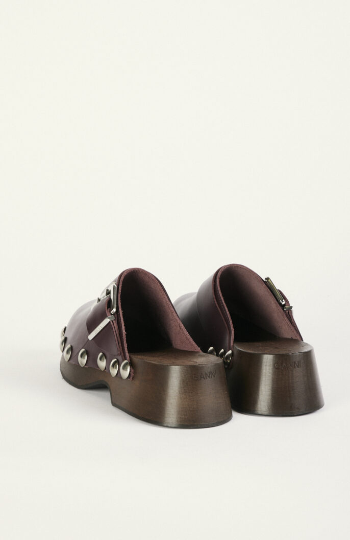 Burgundy brown leather clogs with studs