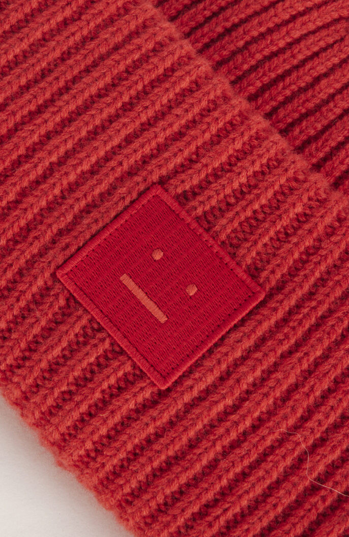 Mütze “063” mit "Face" Logo in Rot-orange